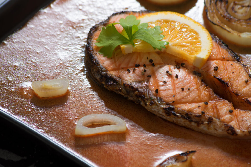 Grilled salmon topped with citrus