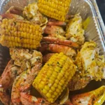 The King's Sauce over corn and seafood