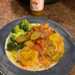 The King's Sauce over veggies, corn and seafood