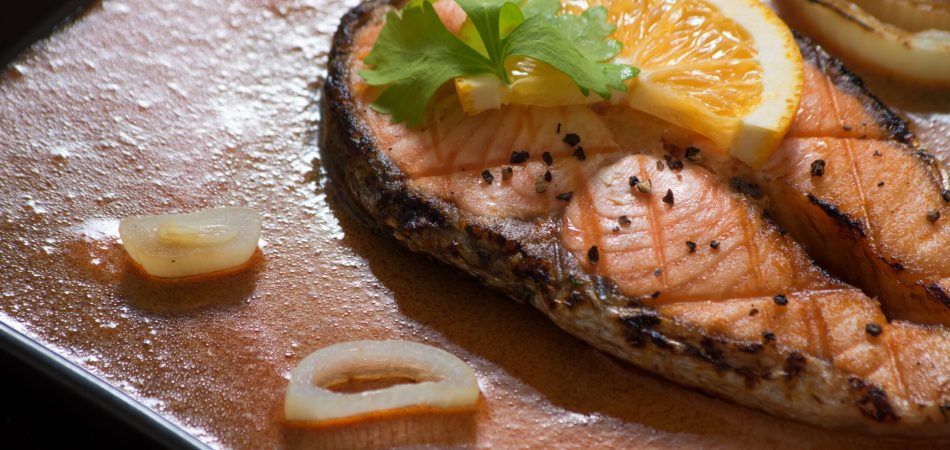 Grilled salmon topped with citrus